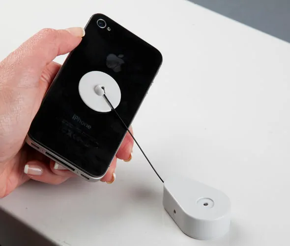 Retractable Security Tether with Adhesive Pad