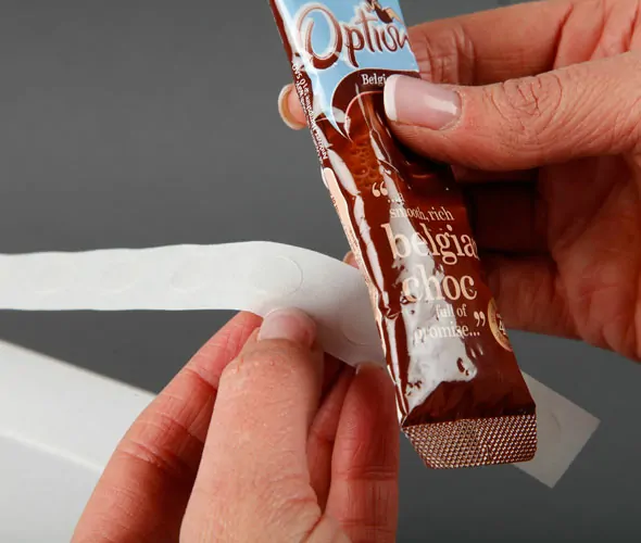 Adhesive double-tack glue dots in low, high and super high tack for POS display